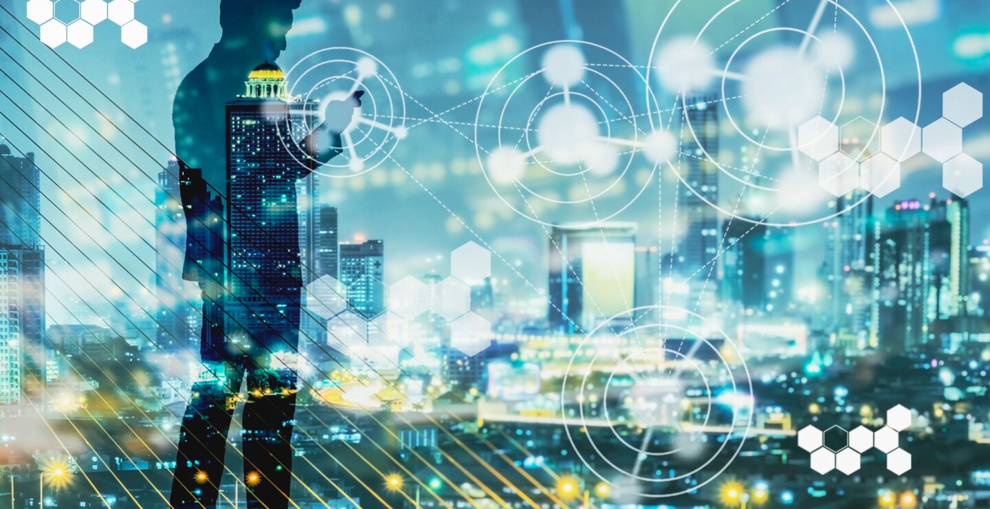 Silhouette of a person in a nighttime city, surrounded by digital network and data visualizations
